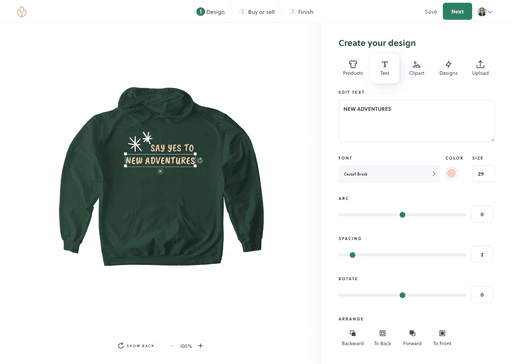 Green hoodie with "Say Yes to New Adventures" slogan design.