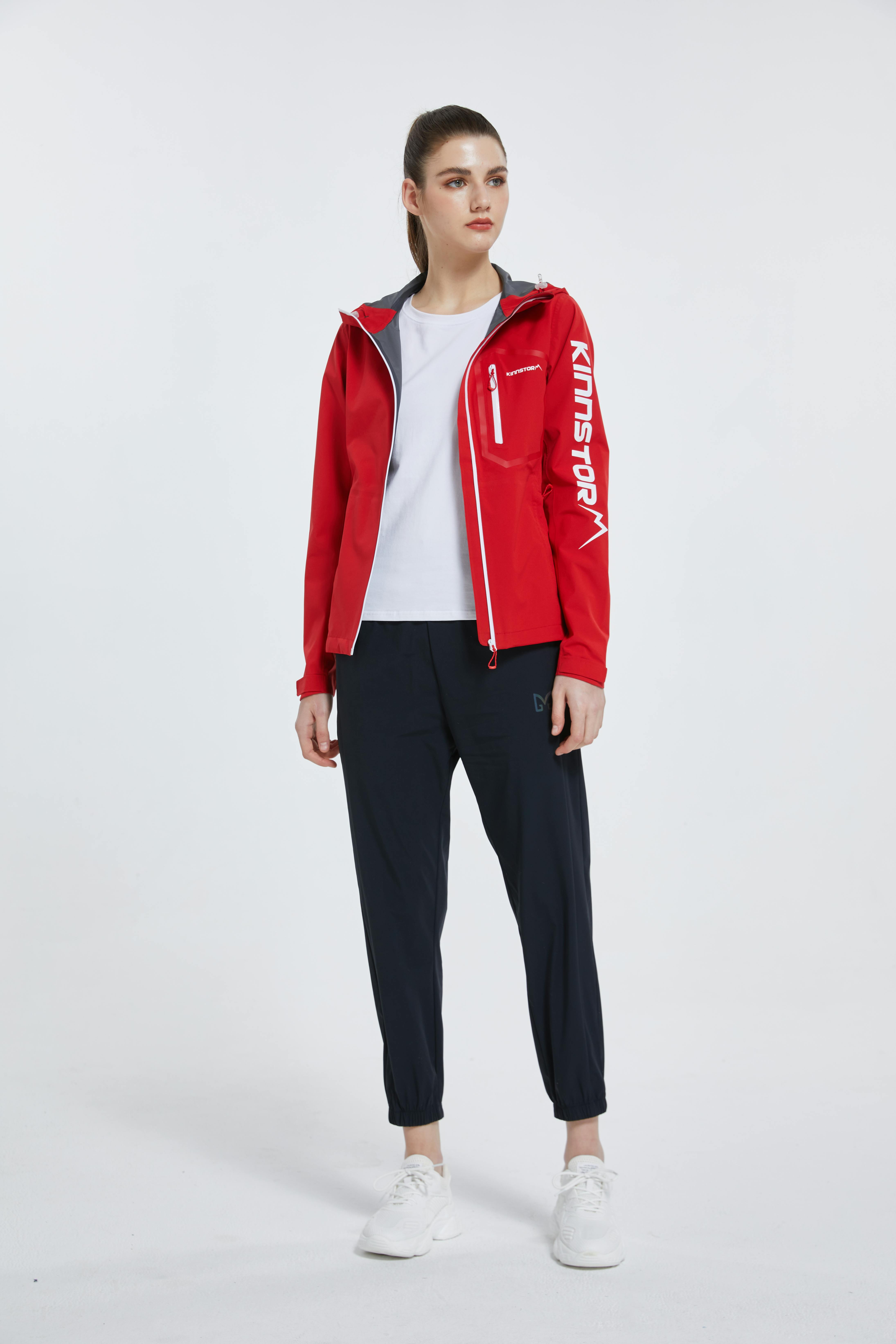 Female model is posing to show red jacket