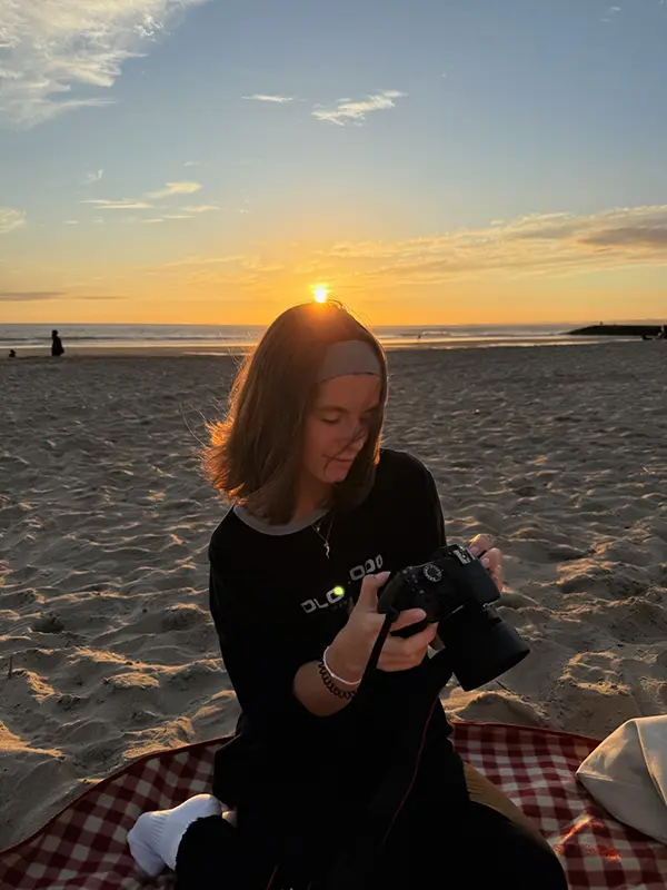 a blurry photo of a person standing in front of a wall
