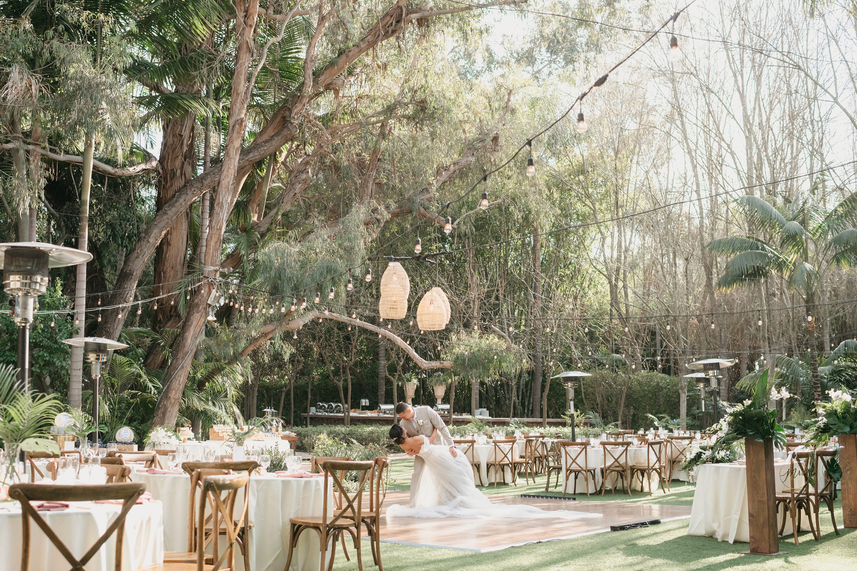 Flat lay wedding details with bouquet, rings, and sparkling bridal heels
