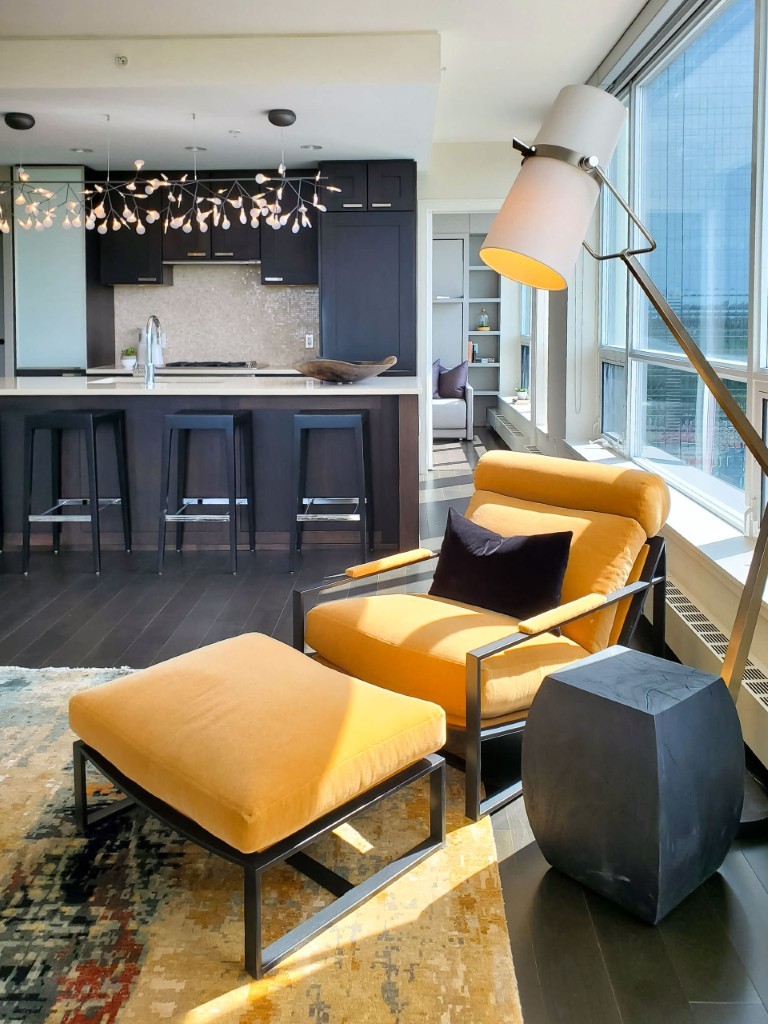 Image of Modern living room with kitchen, featuring KHD Homes interior design and luxurious furniture layout.