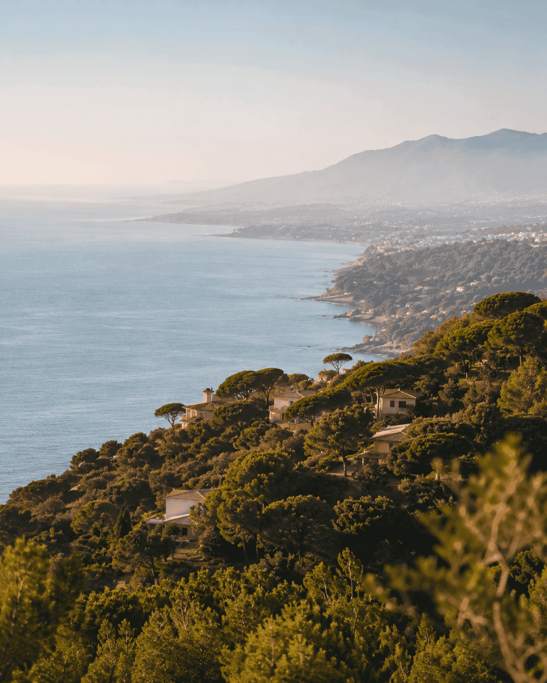 High-end residential properties and coastal towns along the scenic coastline near Barcelona, showcasing premium real estate locations in Maresme.