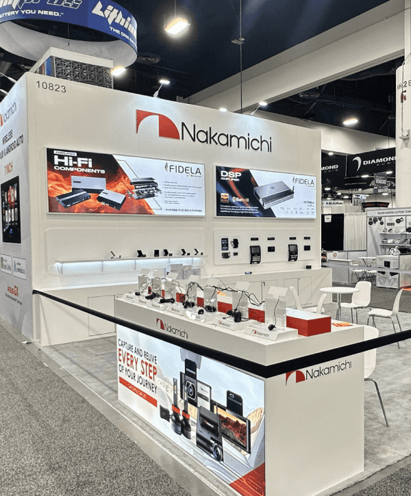 20x20 SEMA booth overview with aftermarket product wall, branded display surfaces, and compact buyer-facing layout