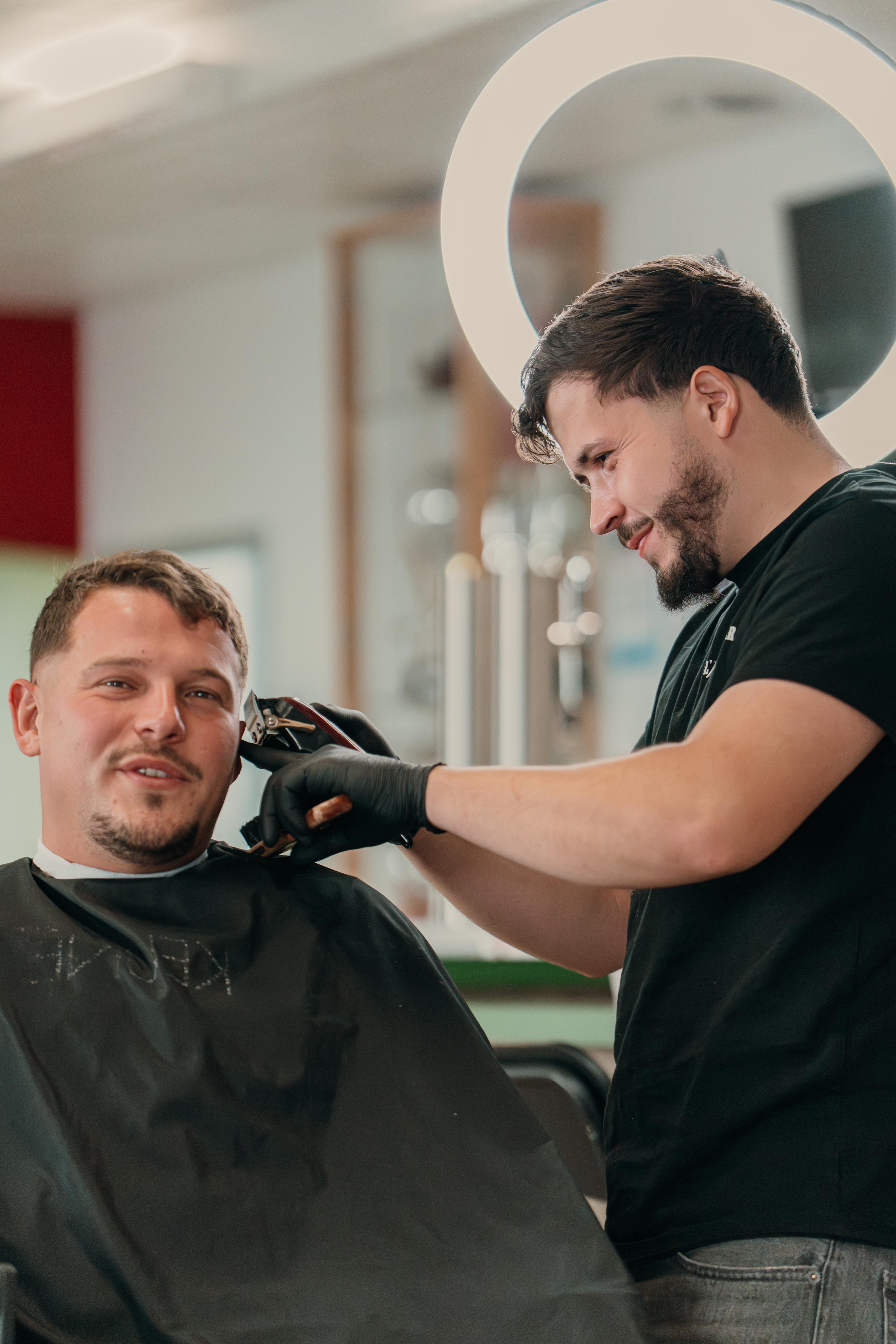 people laughing and talking outside during daytime