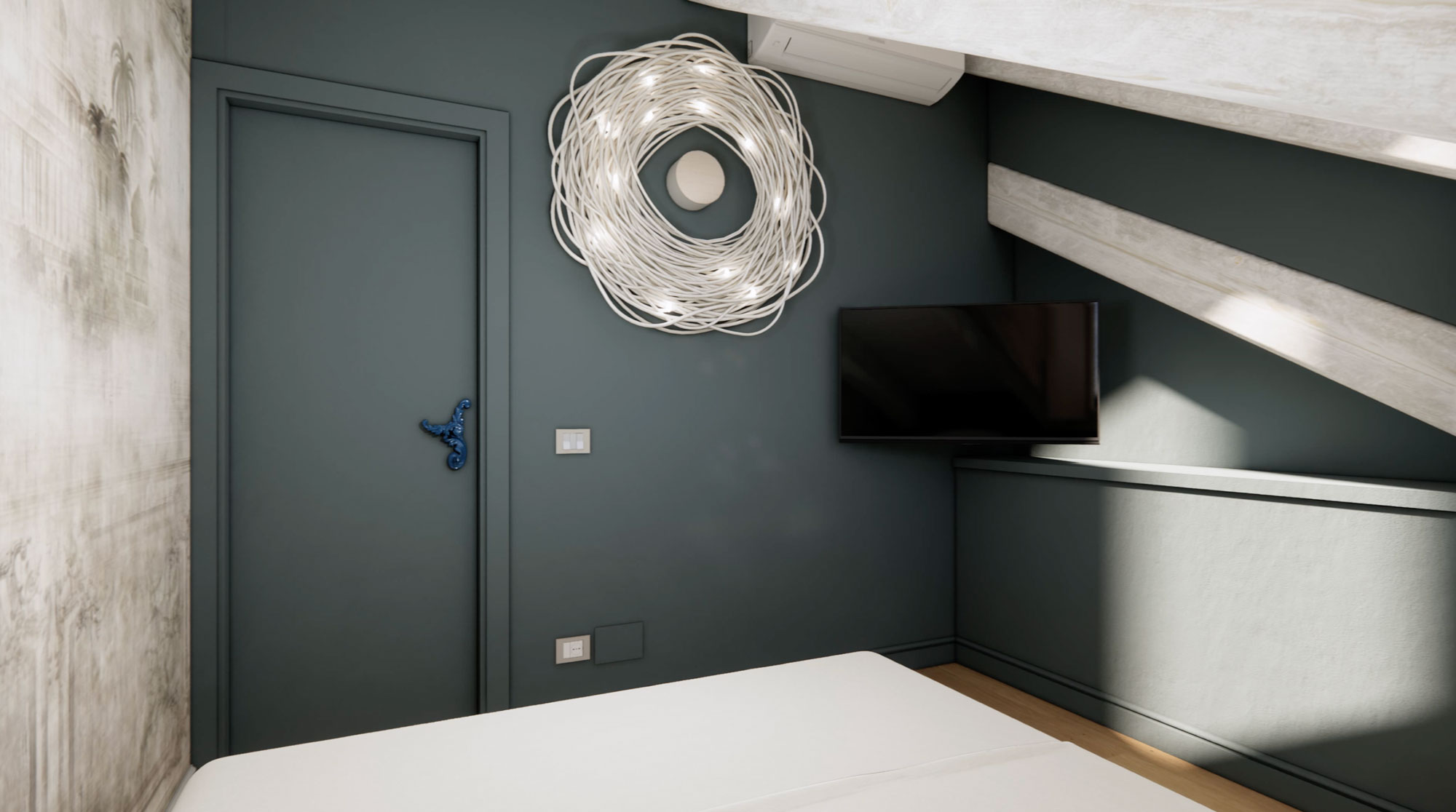 black laptop computer on white bed