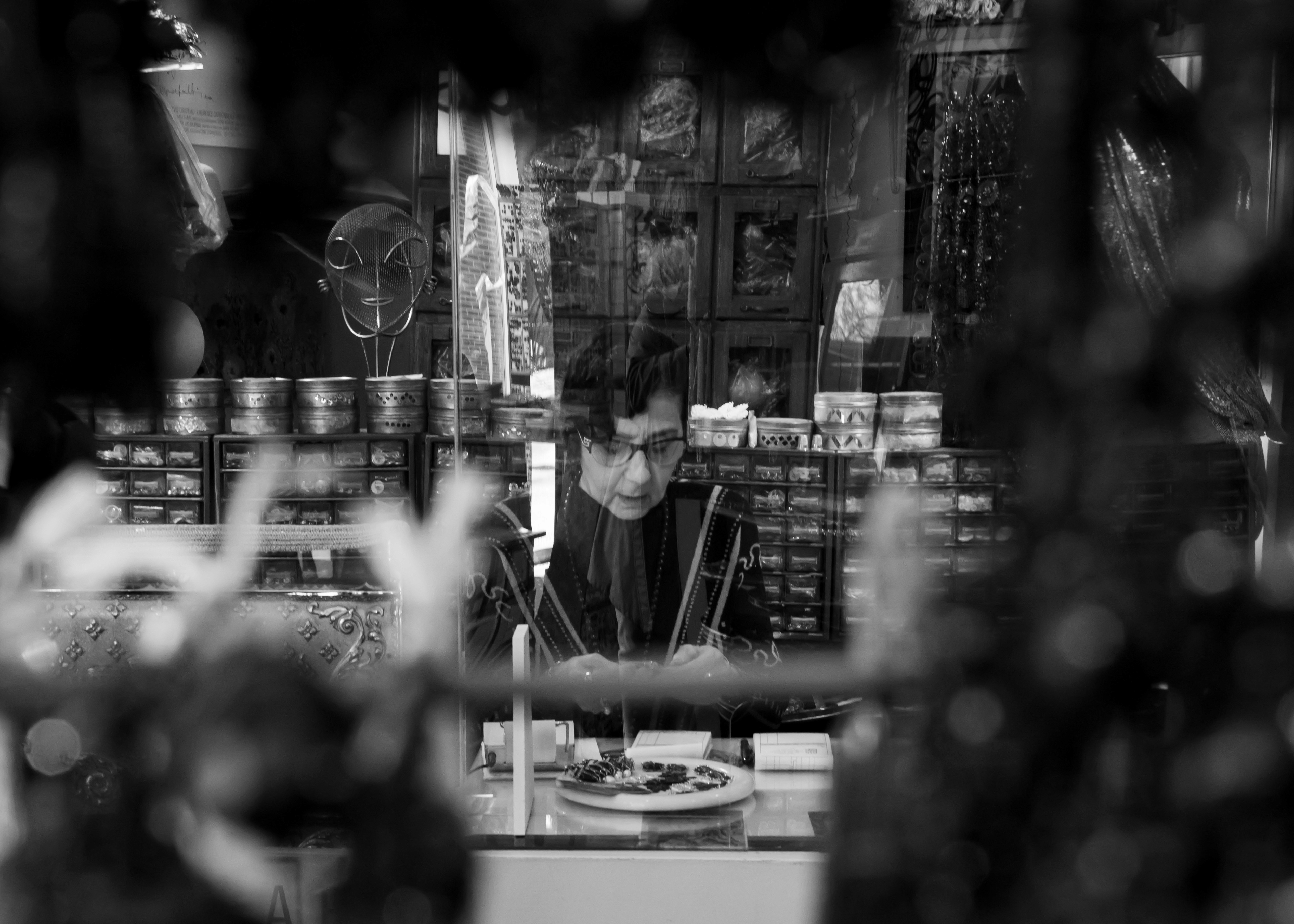 Woman at her counter store