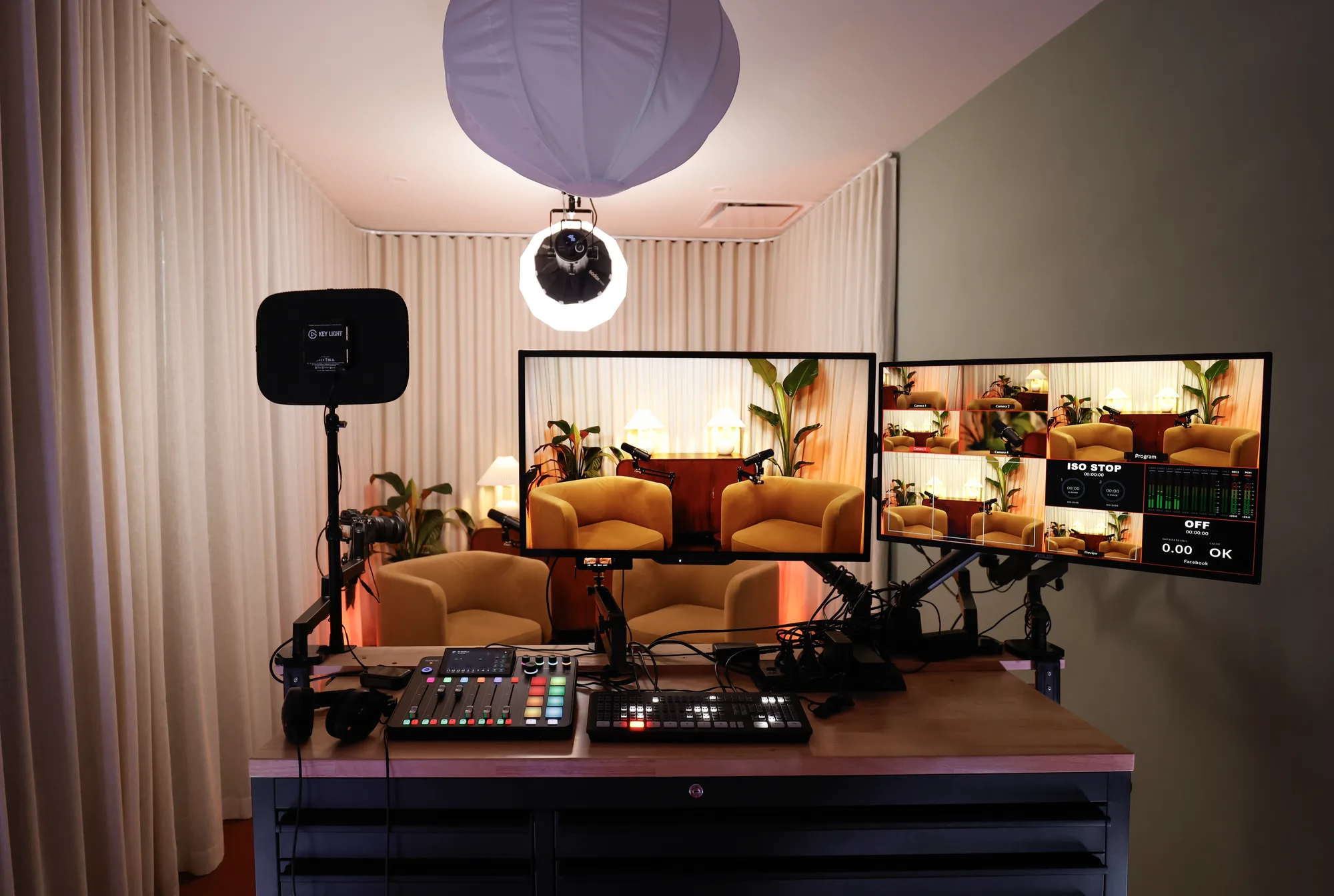 A Collingwood studio set up with mustard armchairs, cameras and a control desk