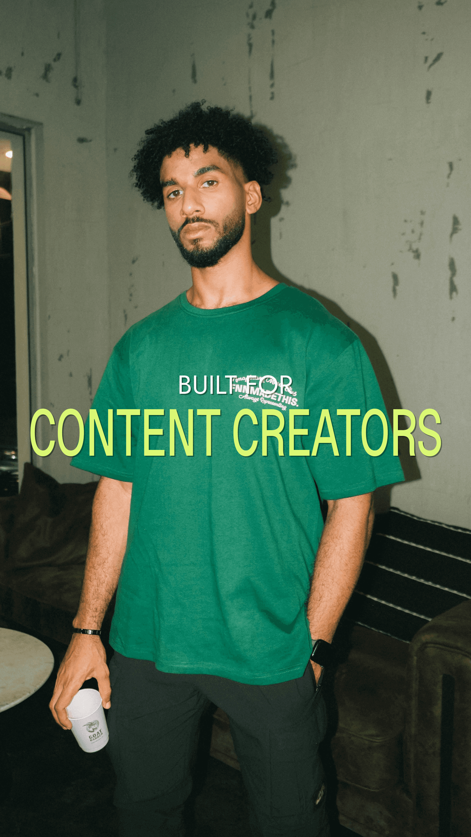 Cocktail sitting on set table next to plate of olives