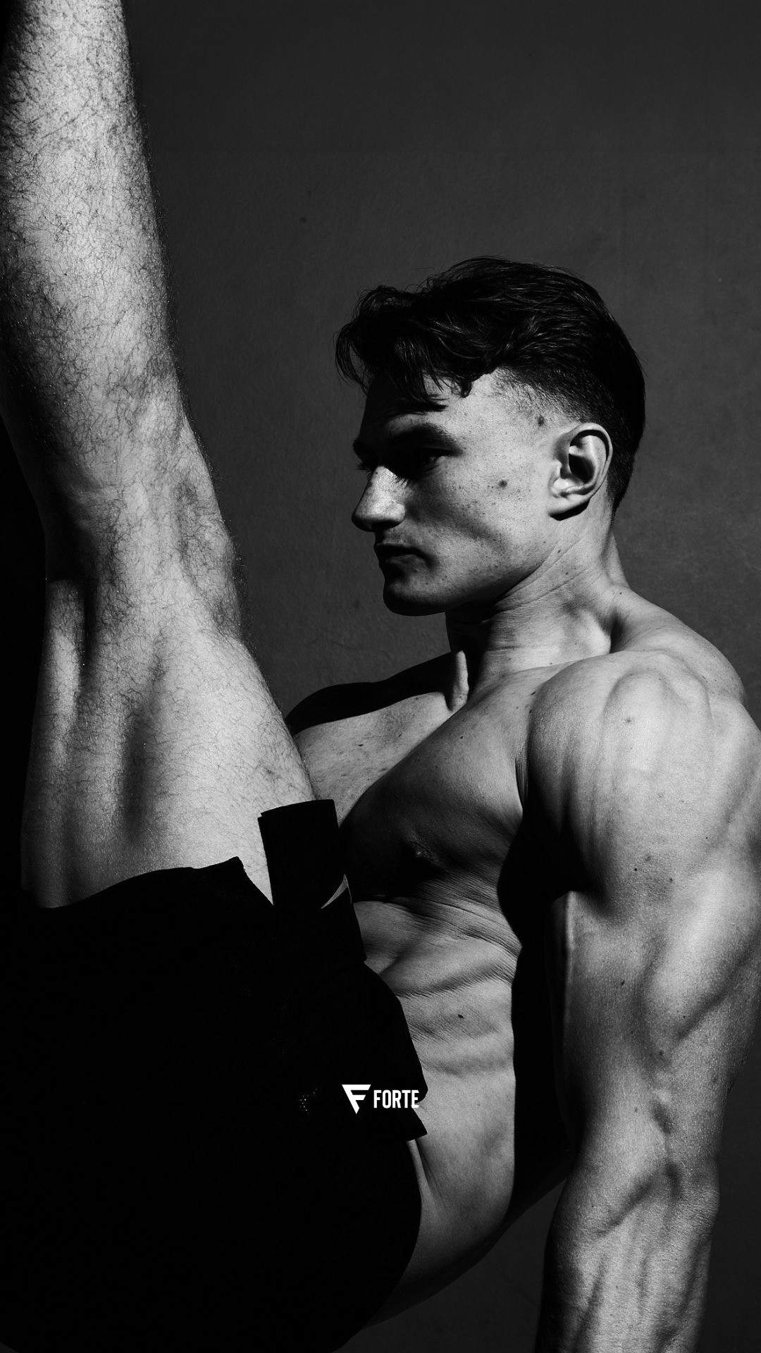 Bride in white dress walking on street, man in background