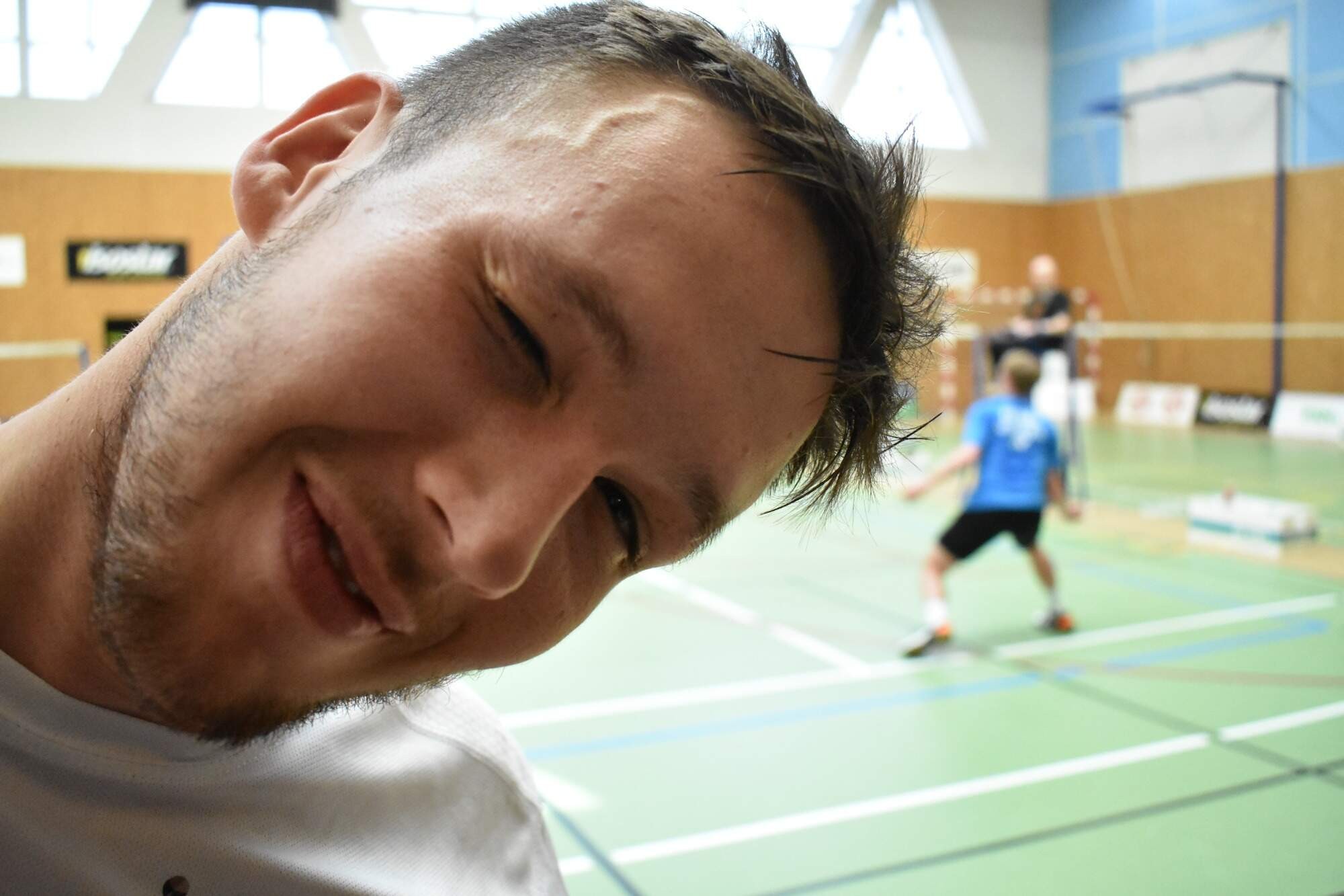 a person holding a small bowl of food