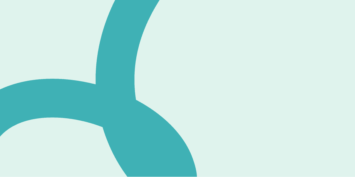 two woman holding each others hand while sitting on couch