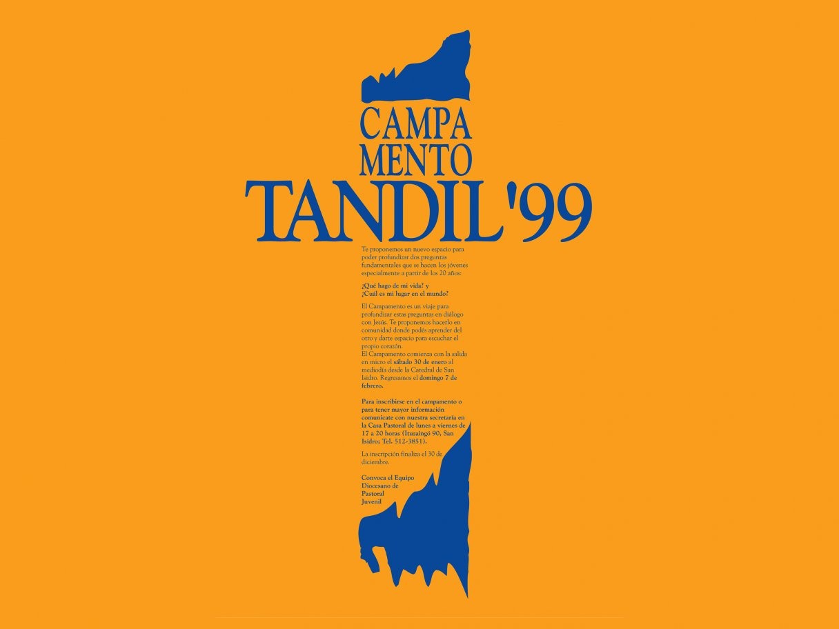 Rooftops of a coastal town with the sea in background