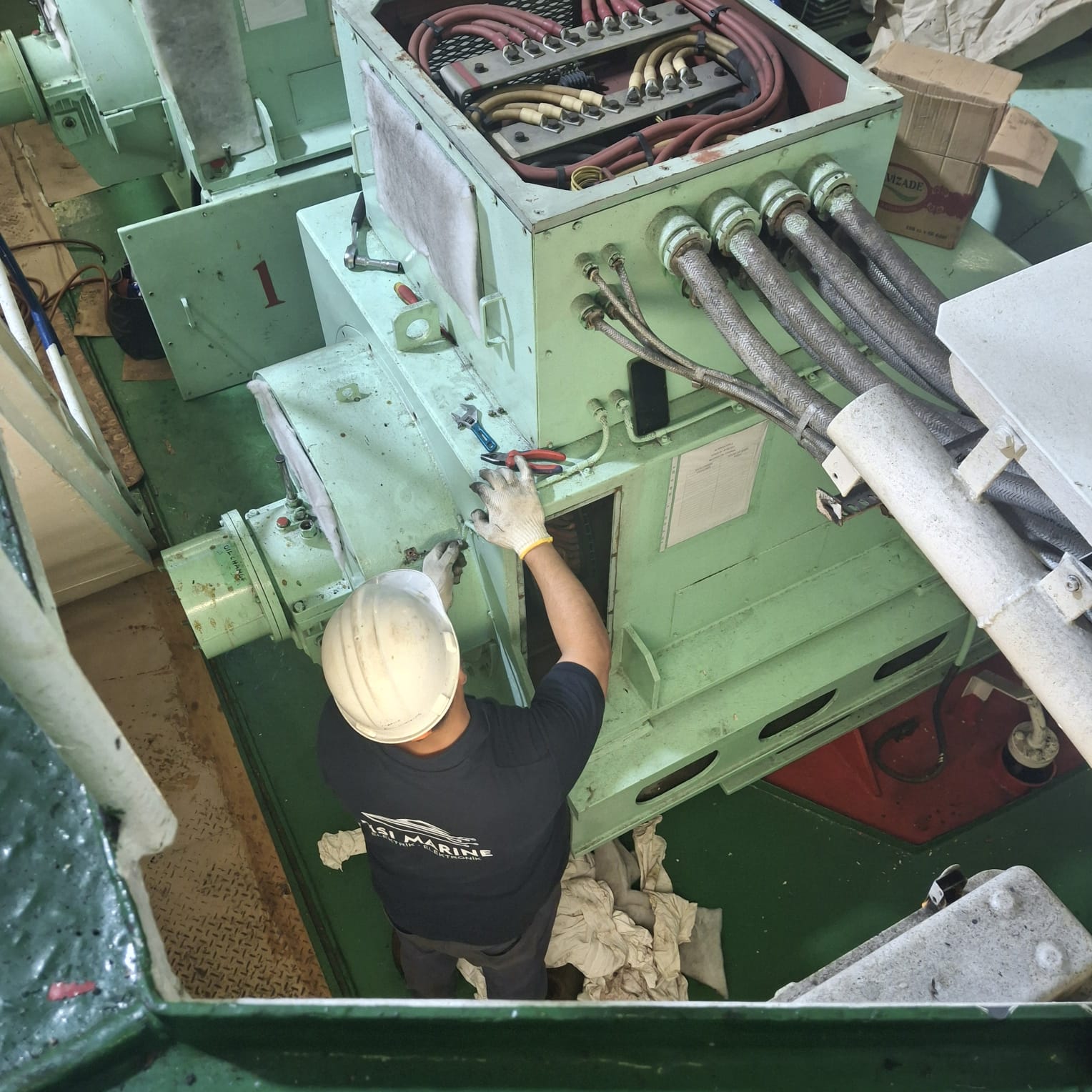 two people looking at a tablet and smiling