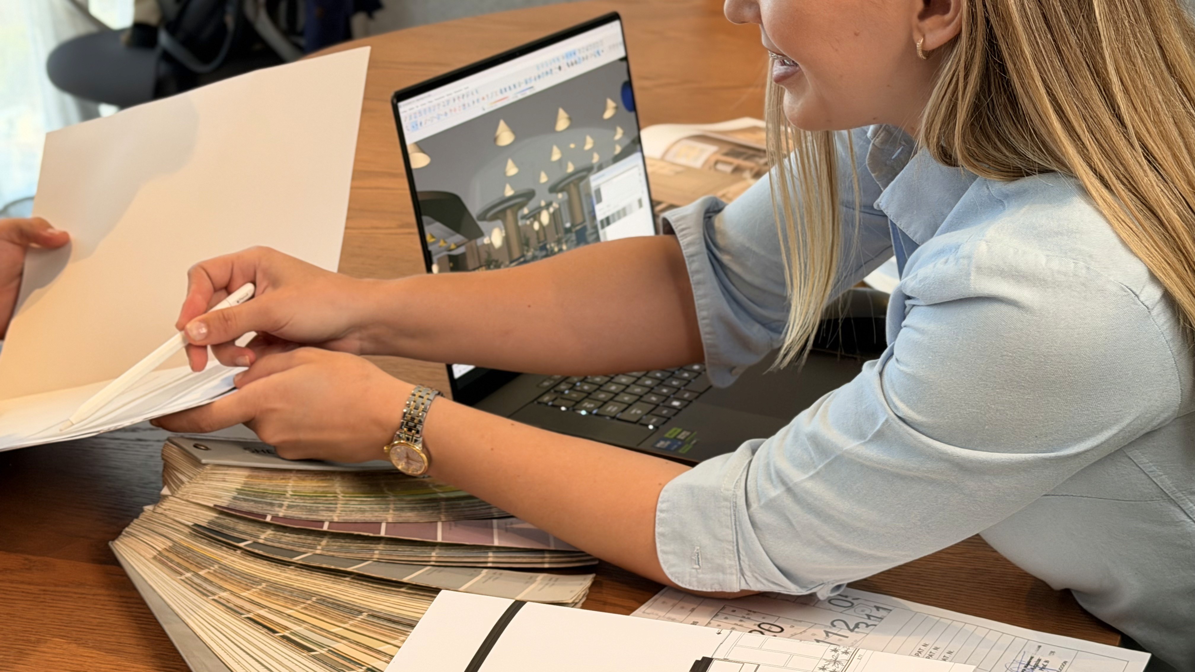 Architecture worker focosing on sketching a building.