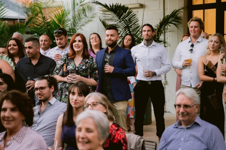 Guests watching the wedding ceremony