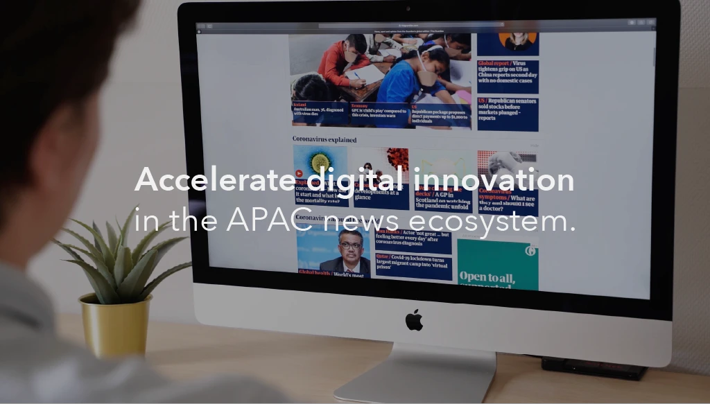An image of a person reading news on their computer with the text "Accelerate digital innovation in the APAC news ecosystem" inlayed