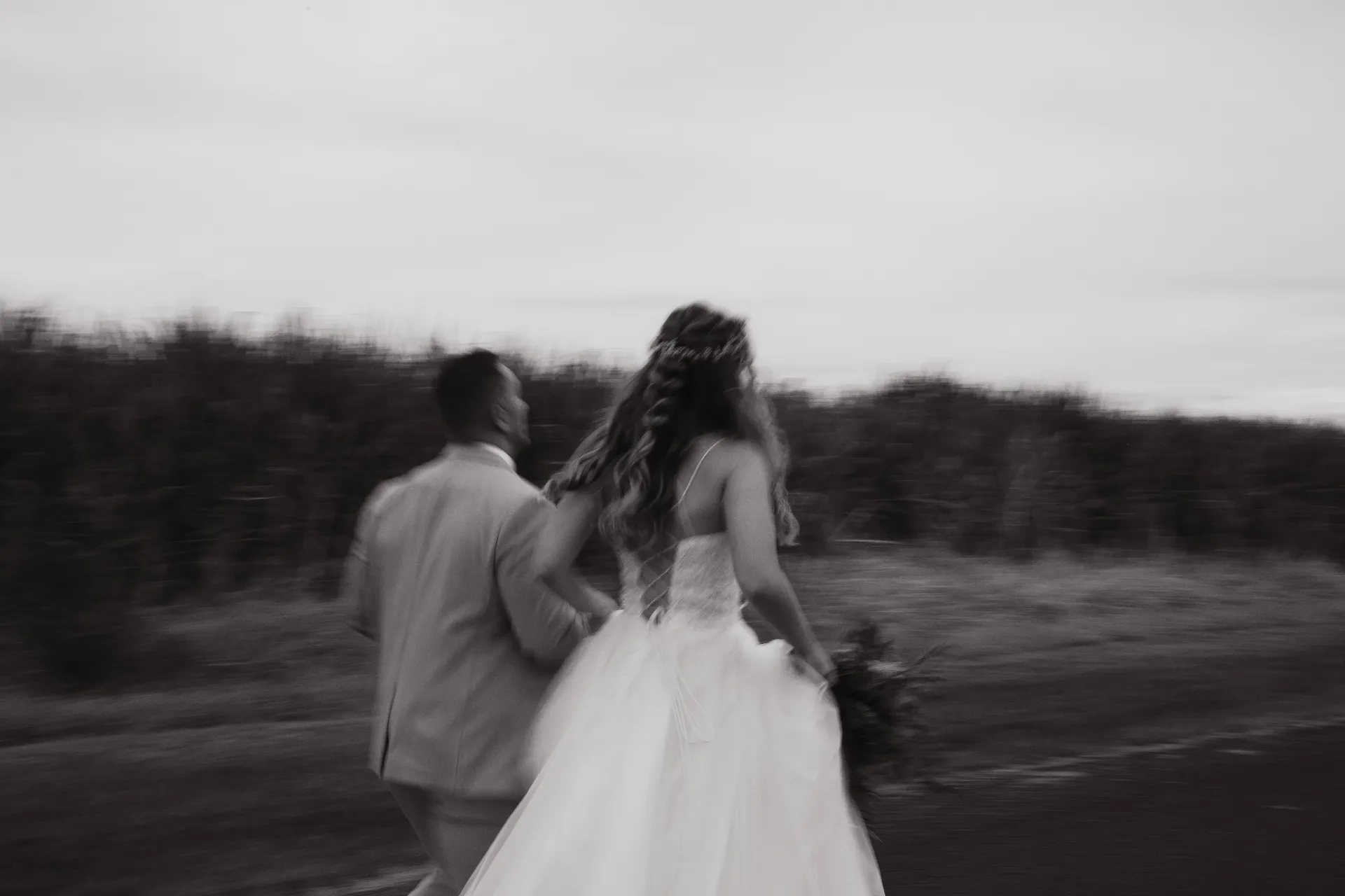 man and woman holding hands focus photo
