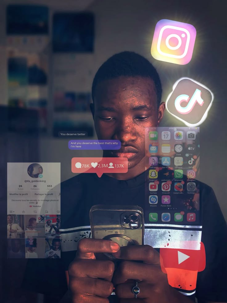 A smiling couple takes a selfie under a clear blue sky. The woman wears a red jacket, and the man, in a green top, holds a smartphone.