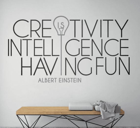 Single tree in a field with light rays.