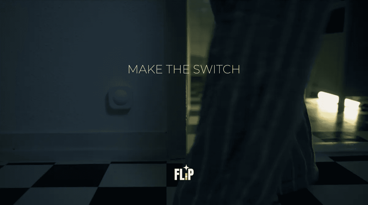 Cinematic advertisement shot of legs walking on a checkered floor with the FLIP brand slogan.