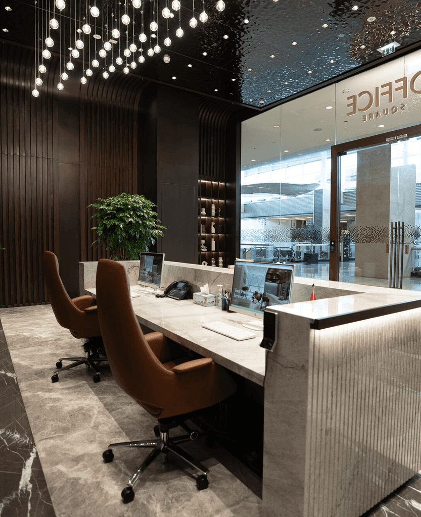 Bright, stylish reception area with comfortable seating, minimalist design, and pro services Abu Dhabi.