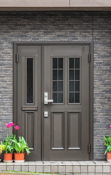 beautiful black door with silver lockset