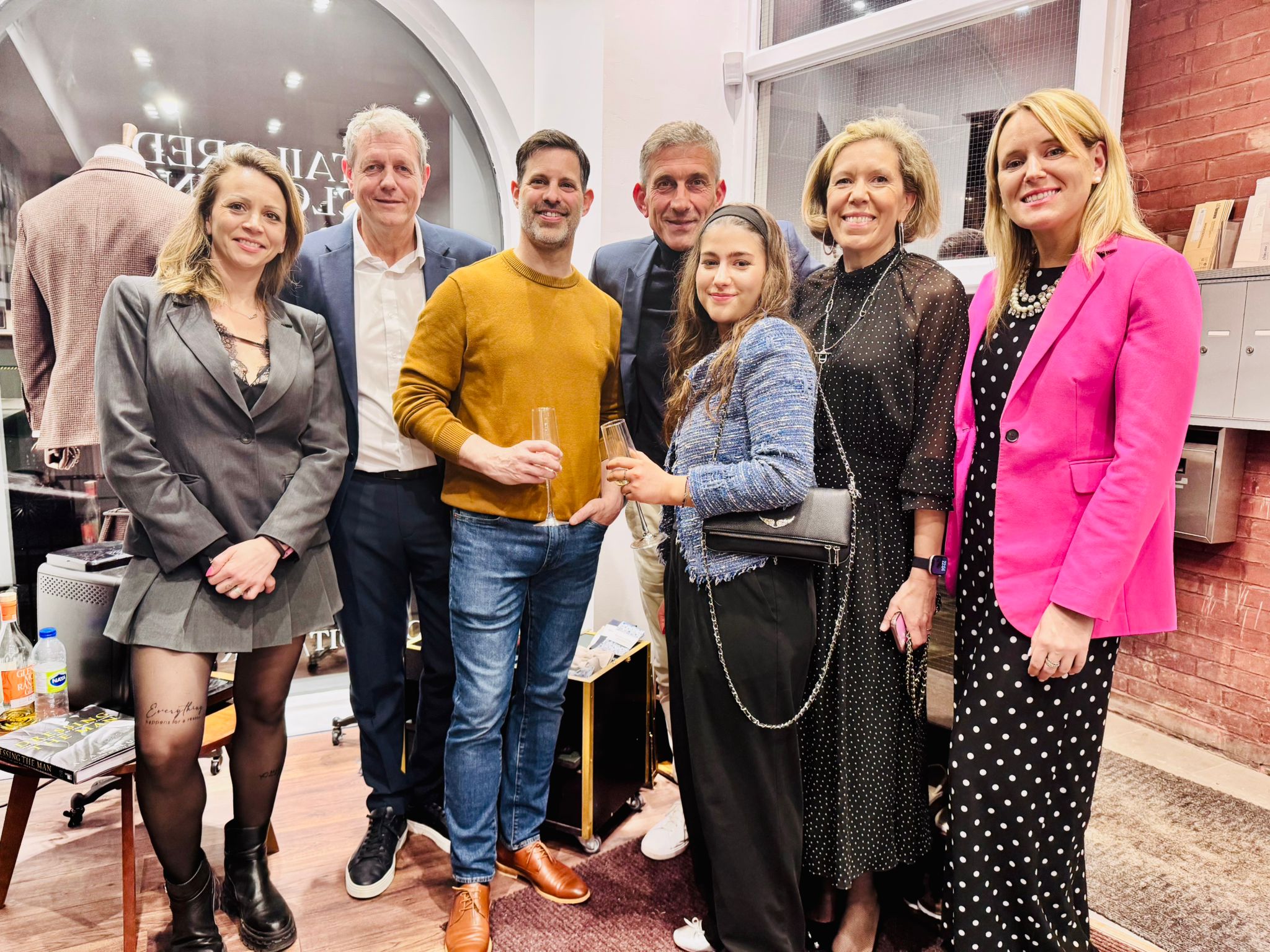 A disco ball hangs from a white ceiling.