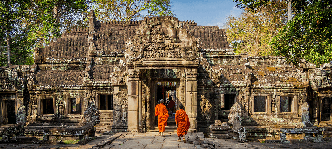 The image captures a moment in time at the Ta Prohm temple