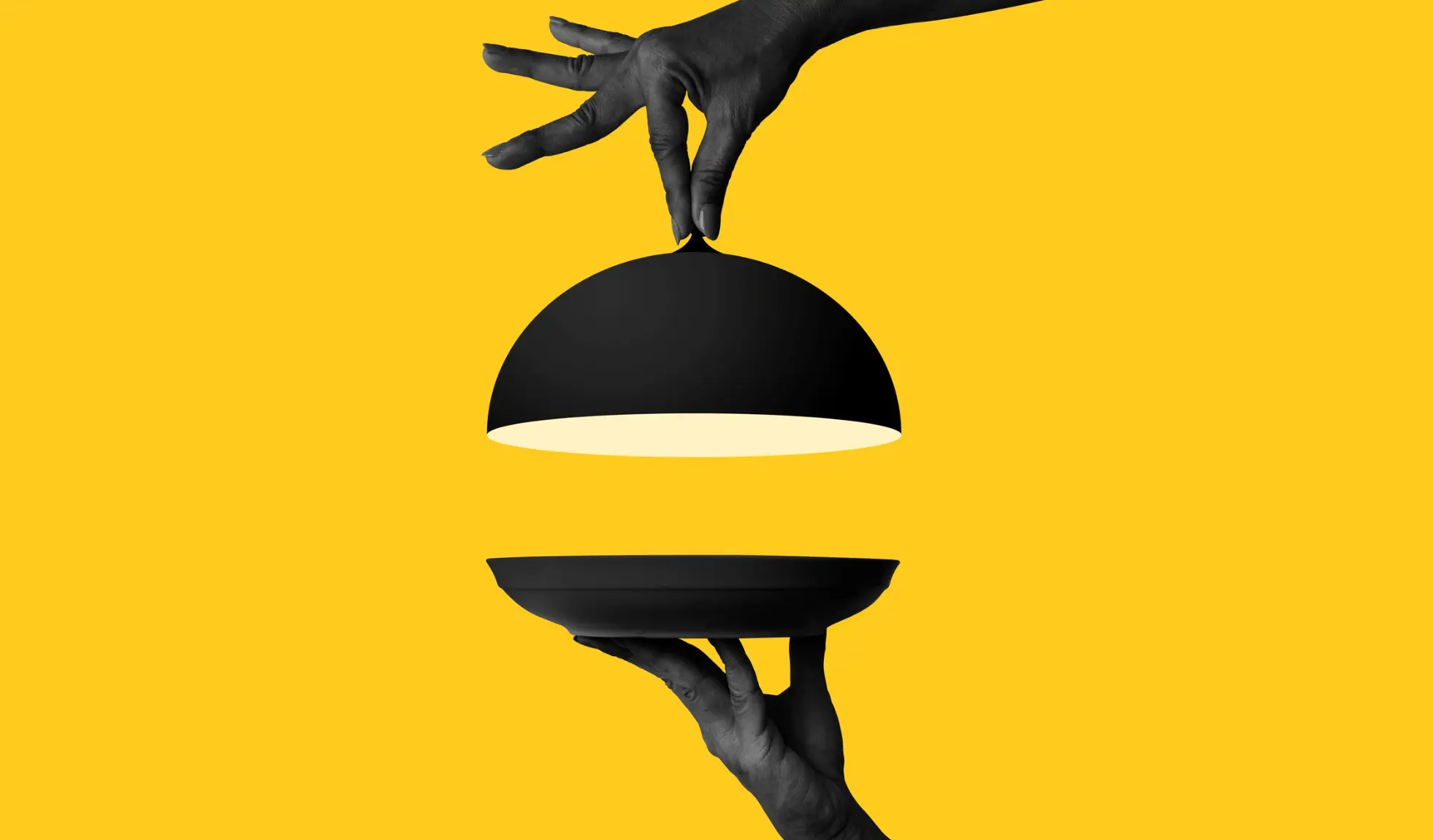 Hands lifting a black cloche dome lid from a serving plate against a yellow background, illustrating the article title 'Culture eats strategy for breakfast'
