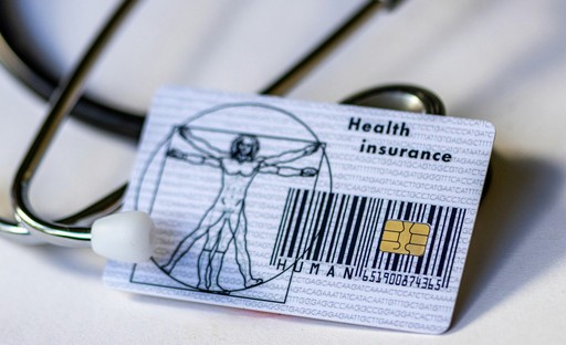 a doctor tool with a health insurance card