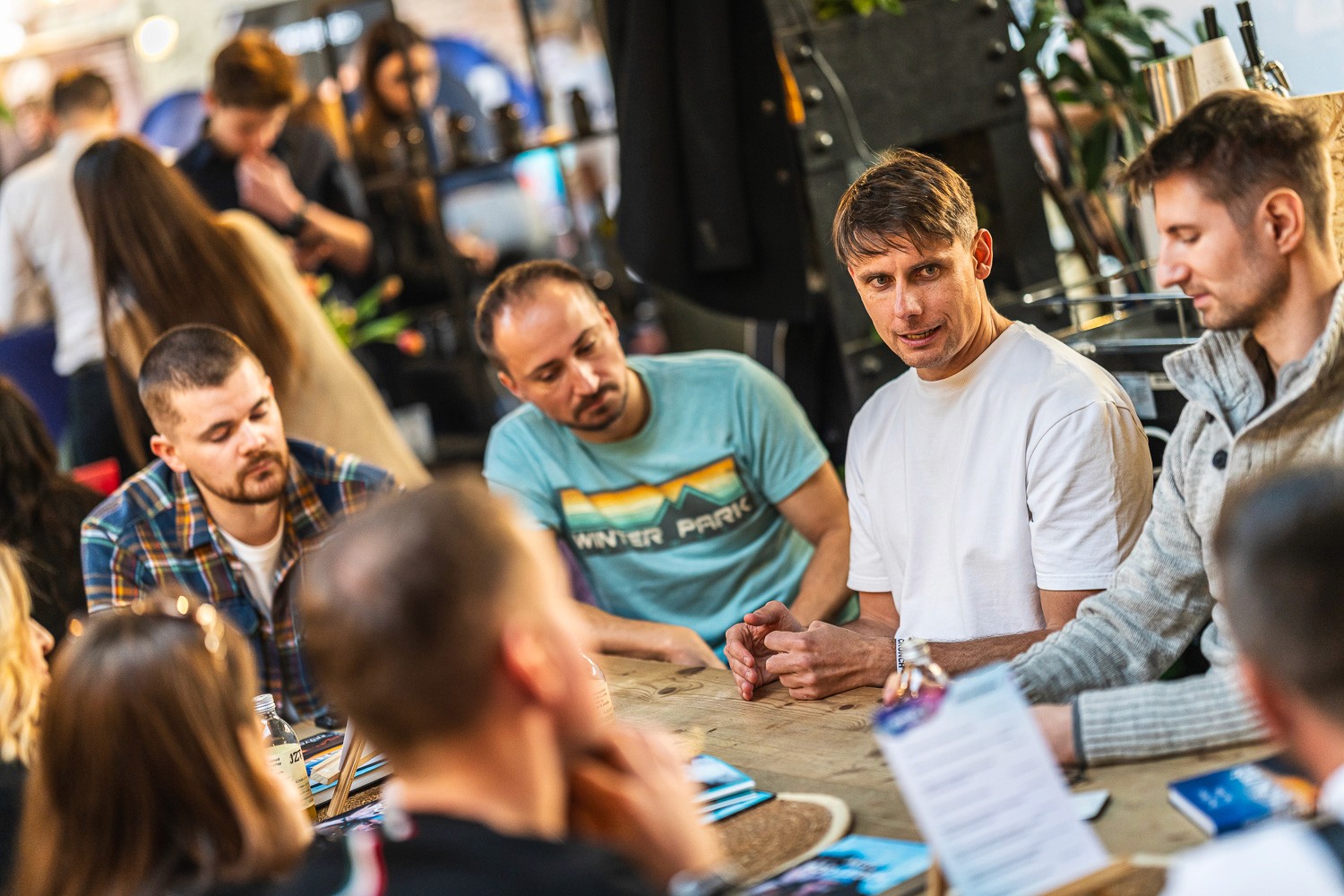 Group discussion during a breakout workshop at a business conference.