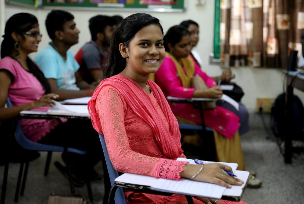 Girl sitting in classroom