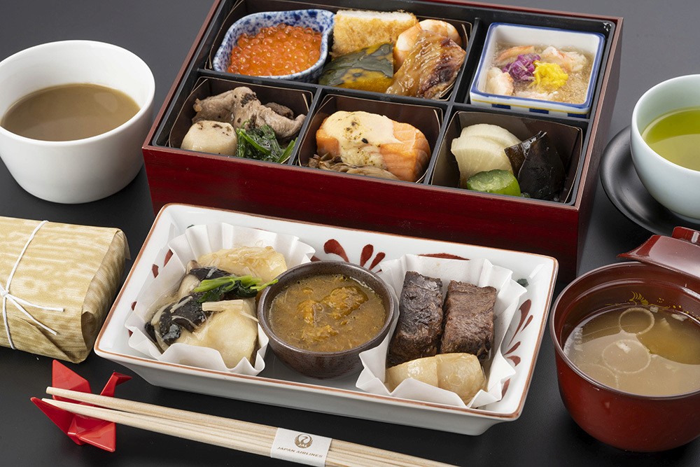 red liquid on cup beside bowl