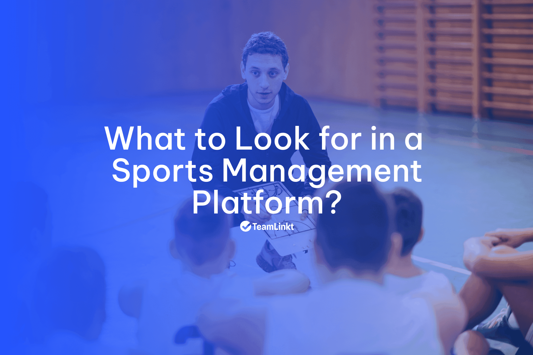 A basketball coaching explaining the game