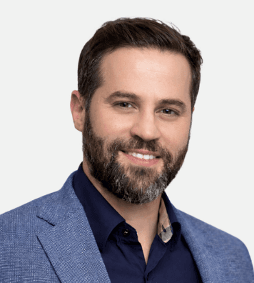 Man smiling in an office