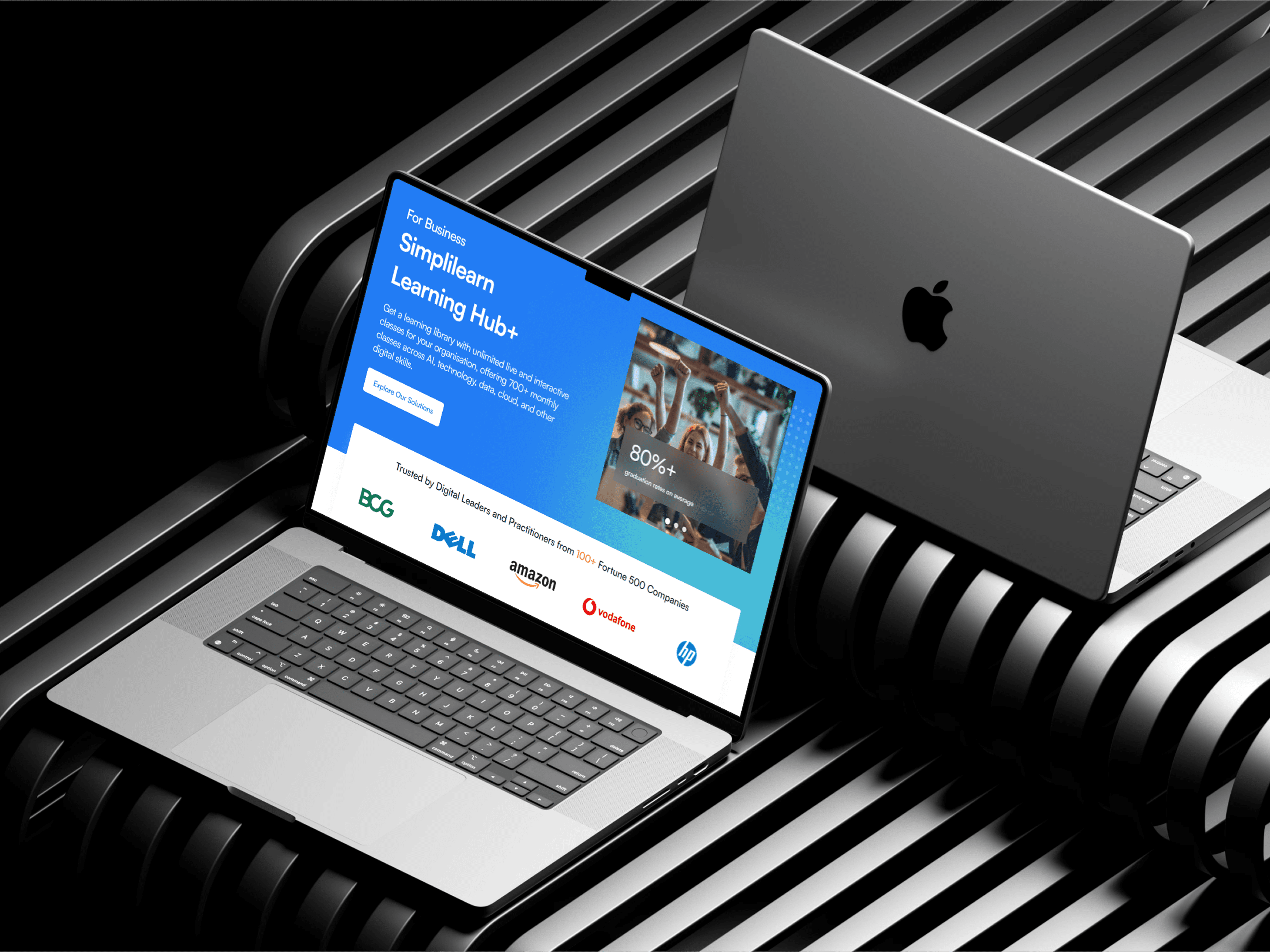 Table and chairs by a sunny window with flowers