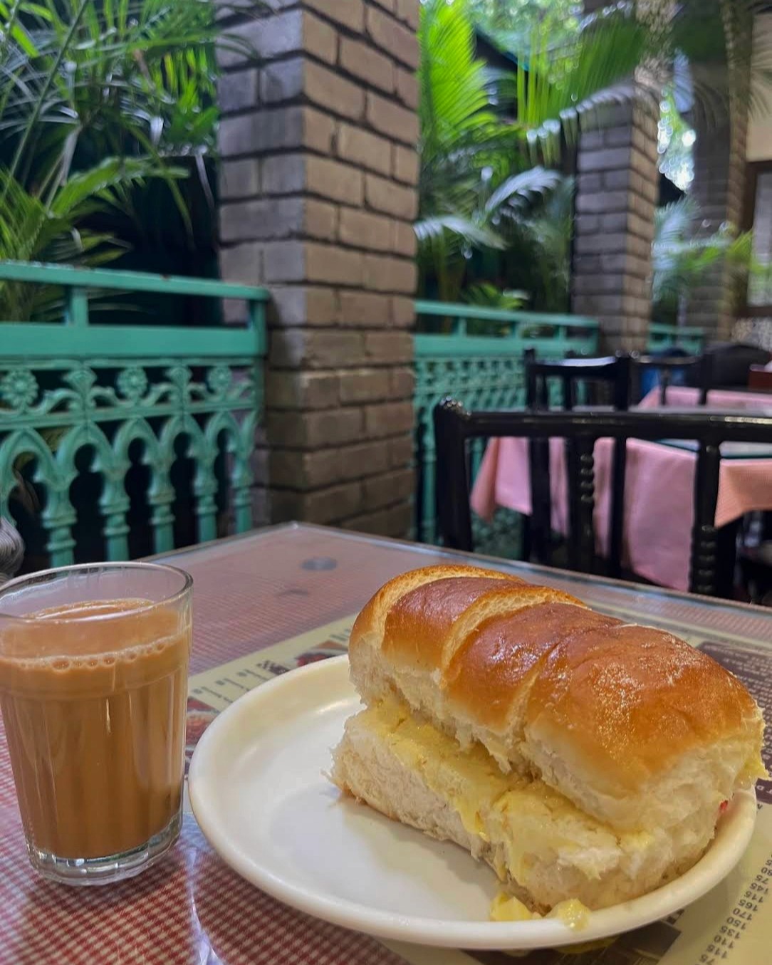 Vintage reel-to-reel tape recorder with clear lid