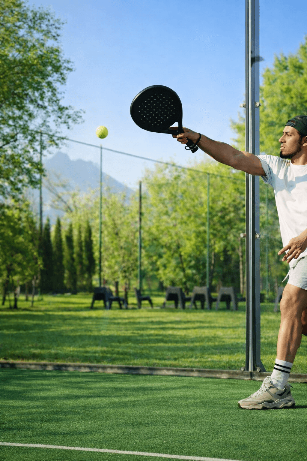 A group of people praticing yoga on the beach in the morning