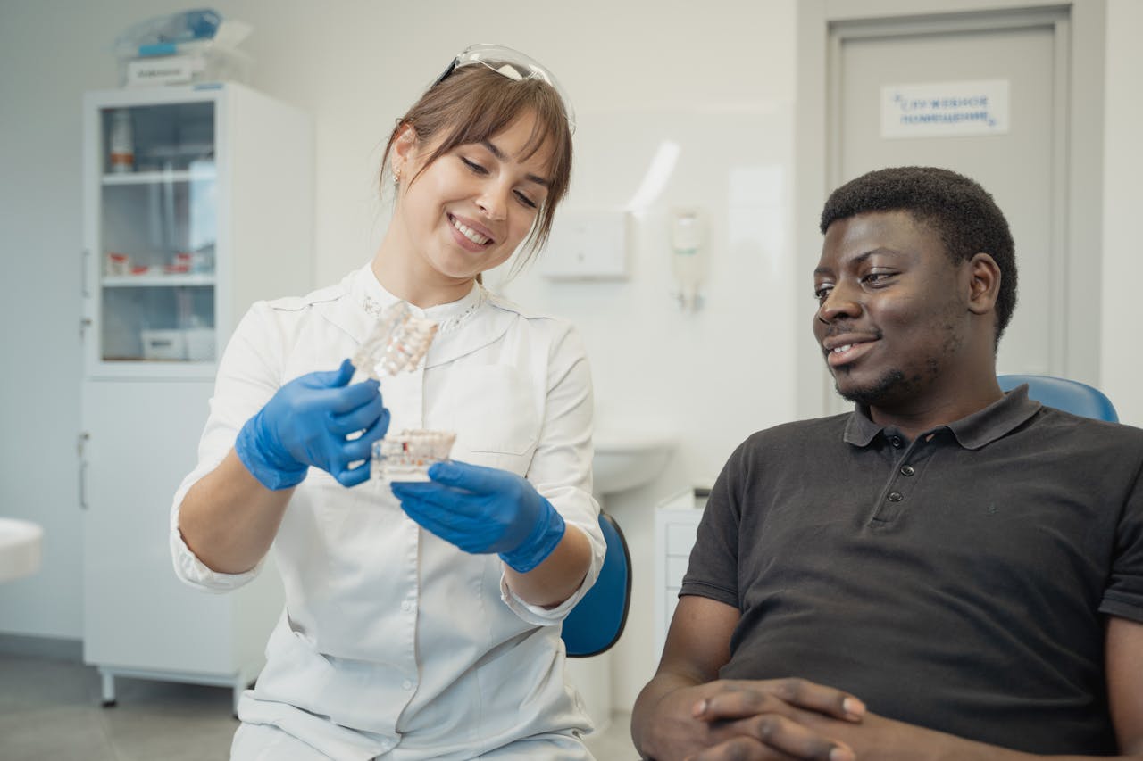 A dentist talking to her patient