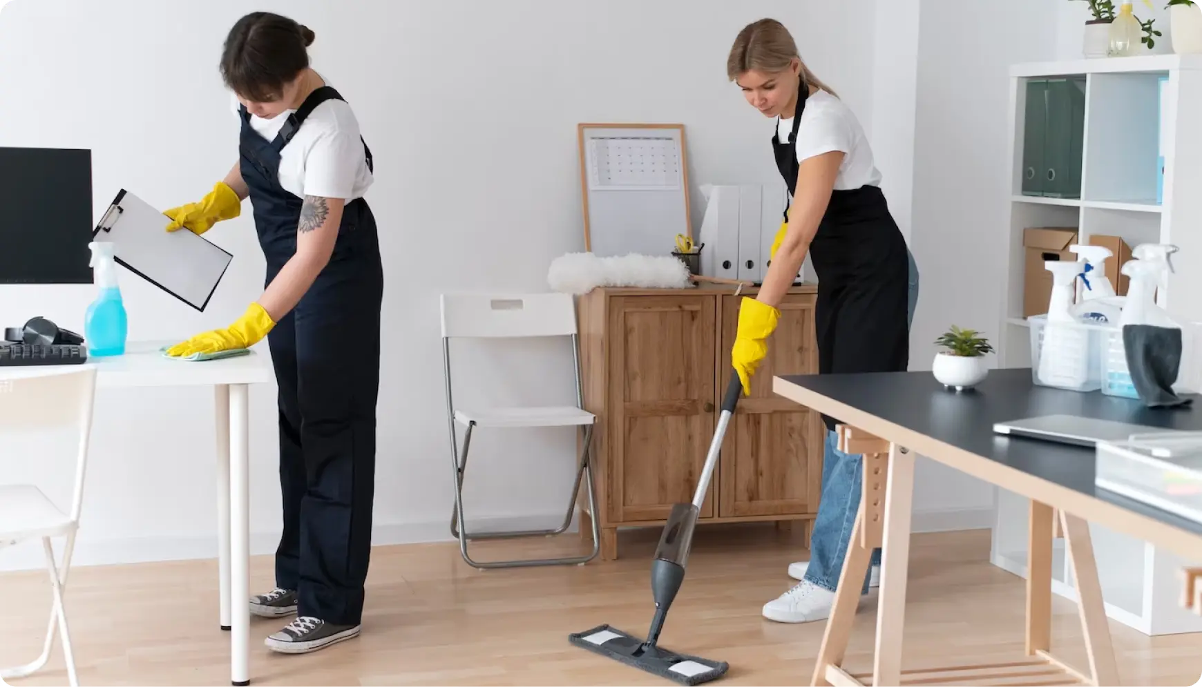 Professional cleaning team working together in modern office space in Cork