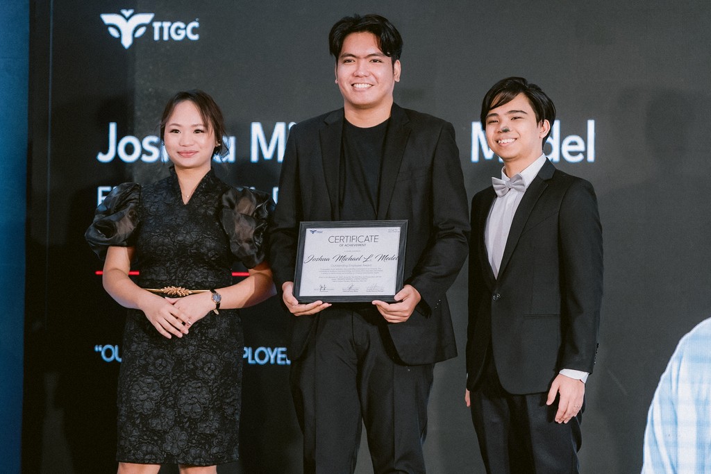 TTGC Employee receiving a certificate