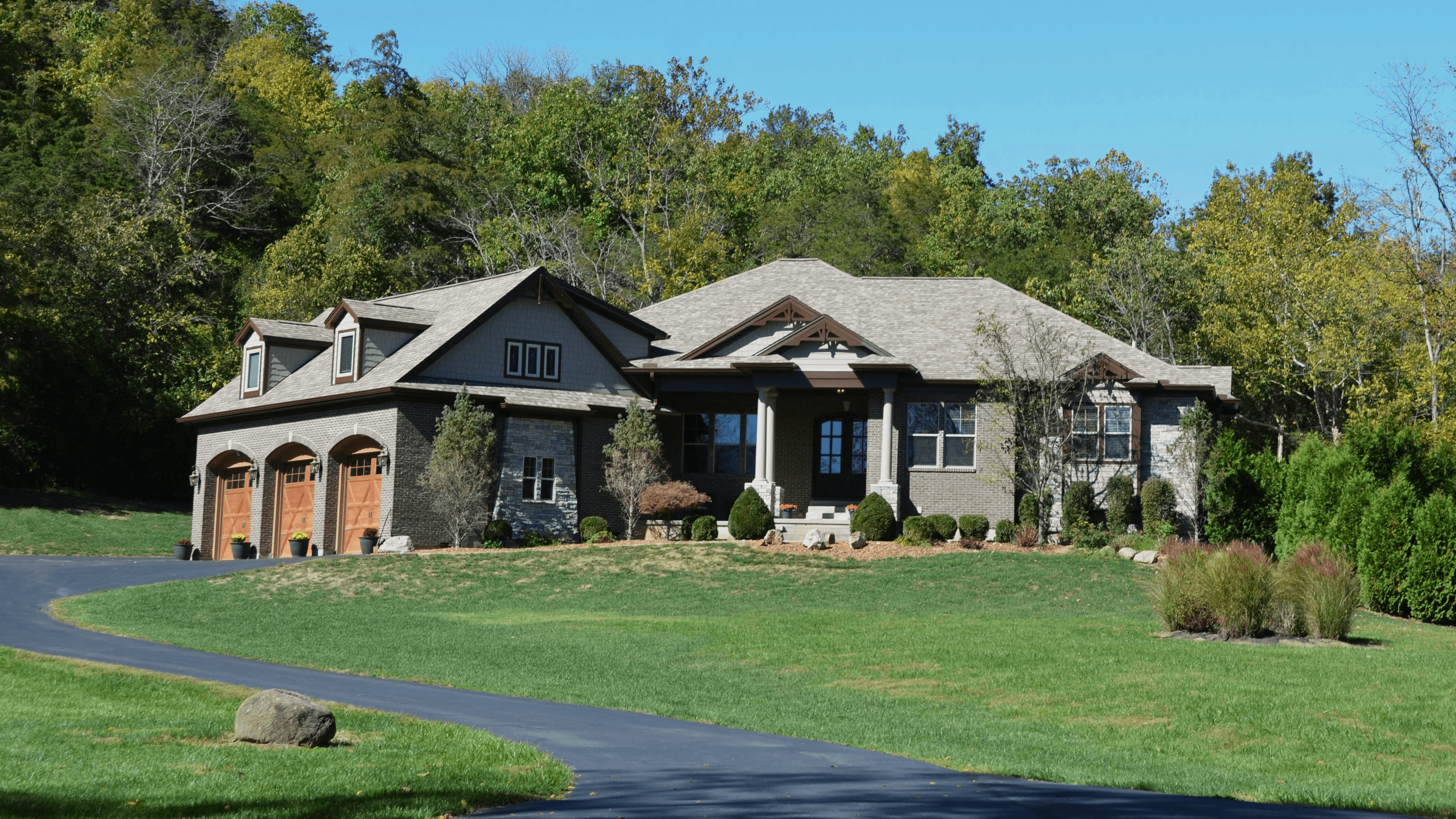 A beautiful country home sits on lush green acreage near Edmond, Oklahoma