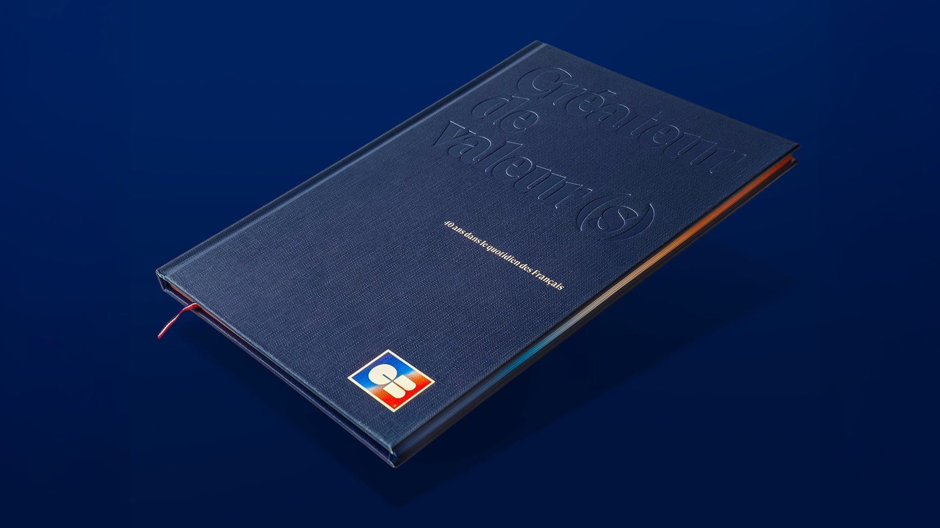 Livre institutionnel pour les 40 ans de Cartes Bancaires (logo CB), avec une couverture bleu foncé texturée où est embossé le titre "Créateur de valeur(s)".
