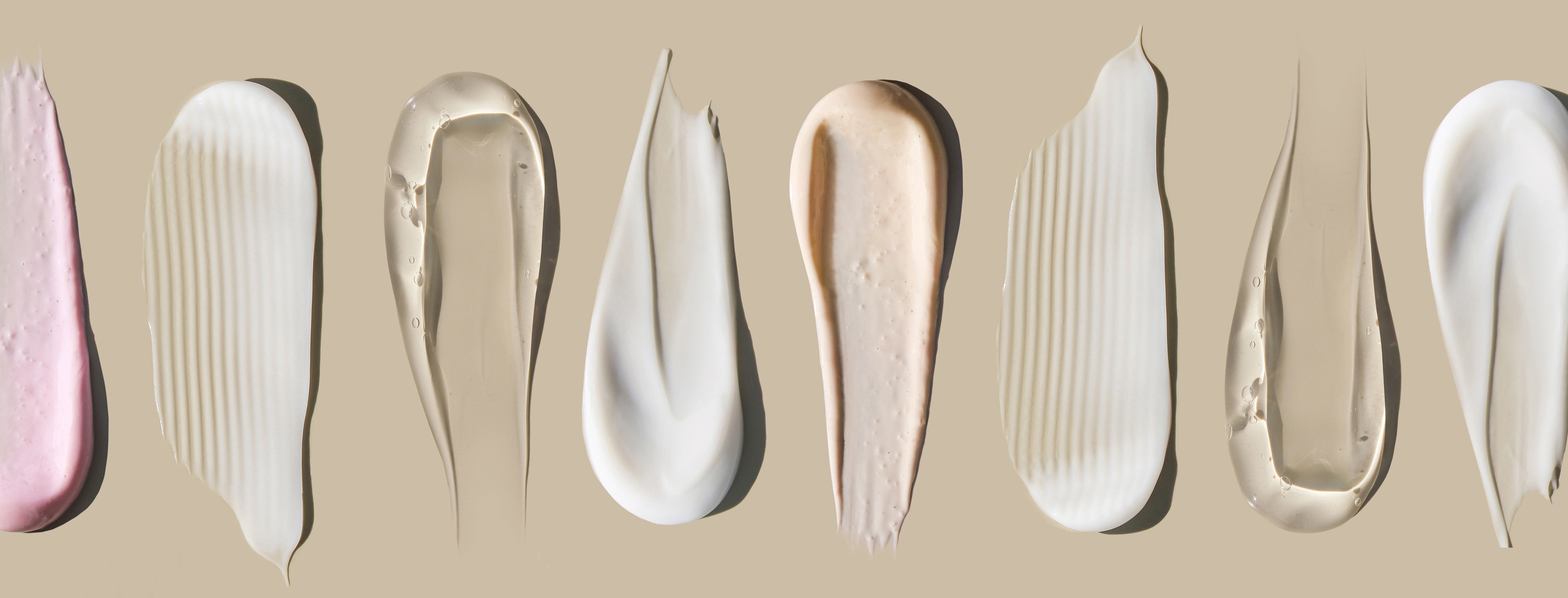 Streetside billboard with flyposters of the Batch.Works brand and illustrations