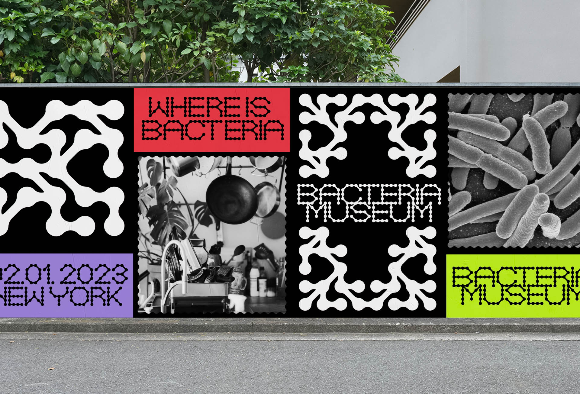 large billboard posters on an outdoor wall