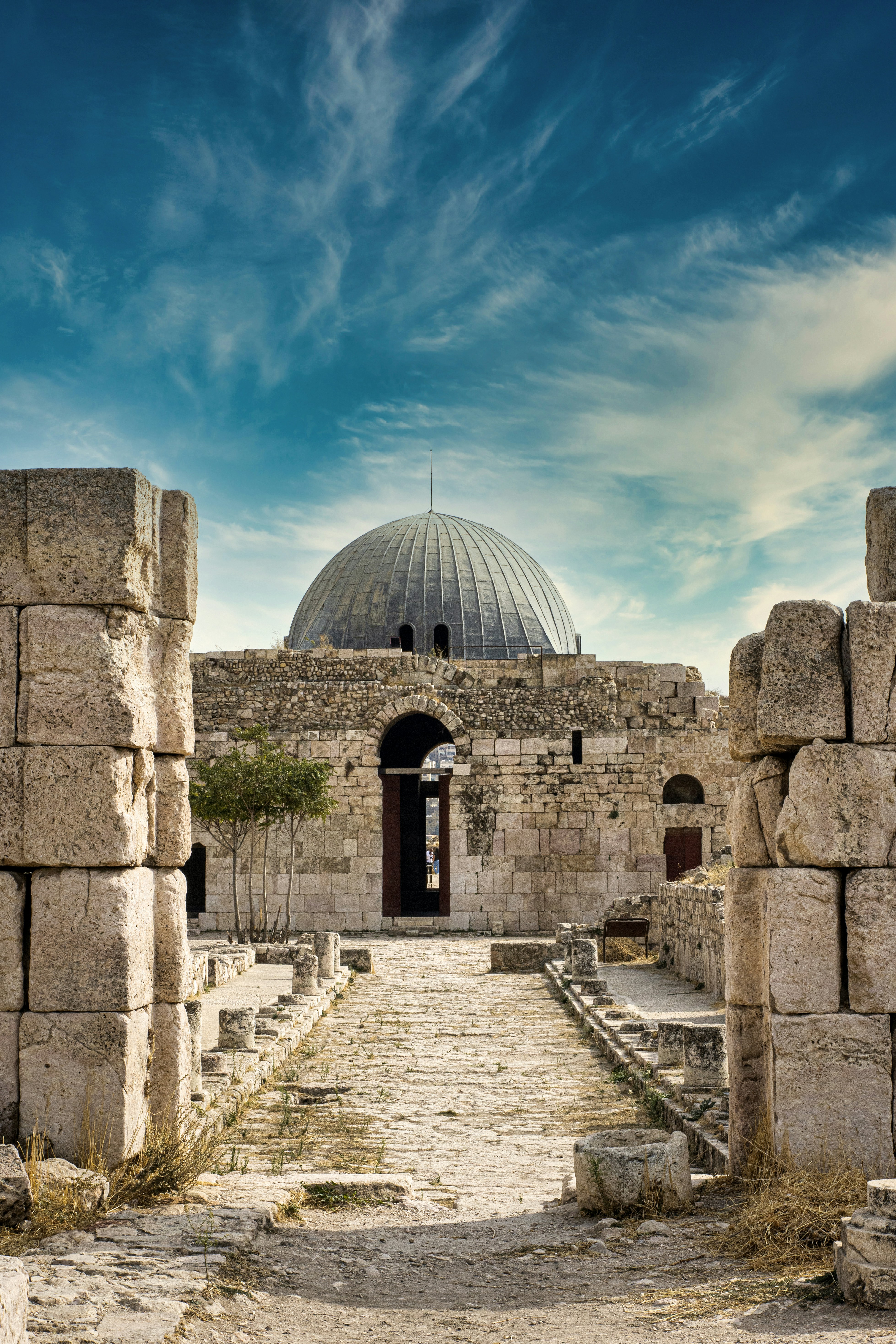 gray concrete building under blue sky during daytime