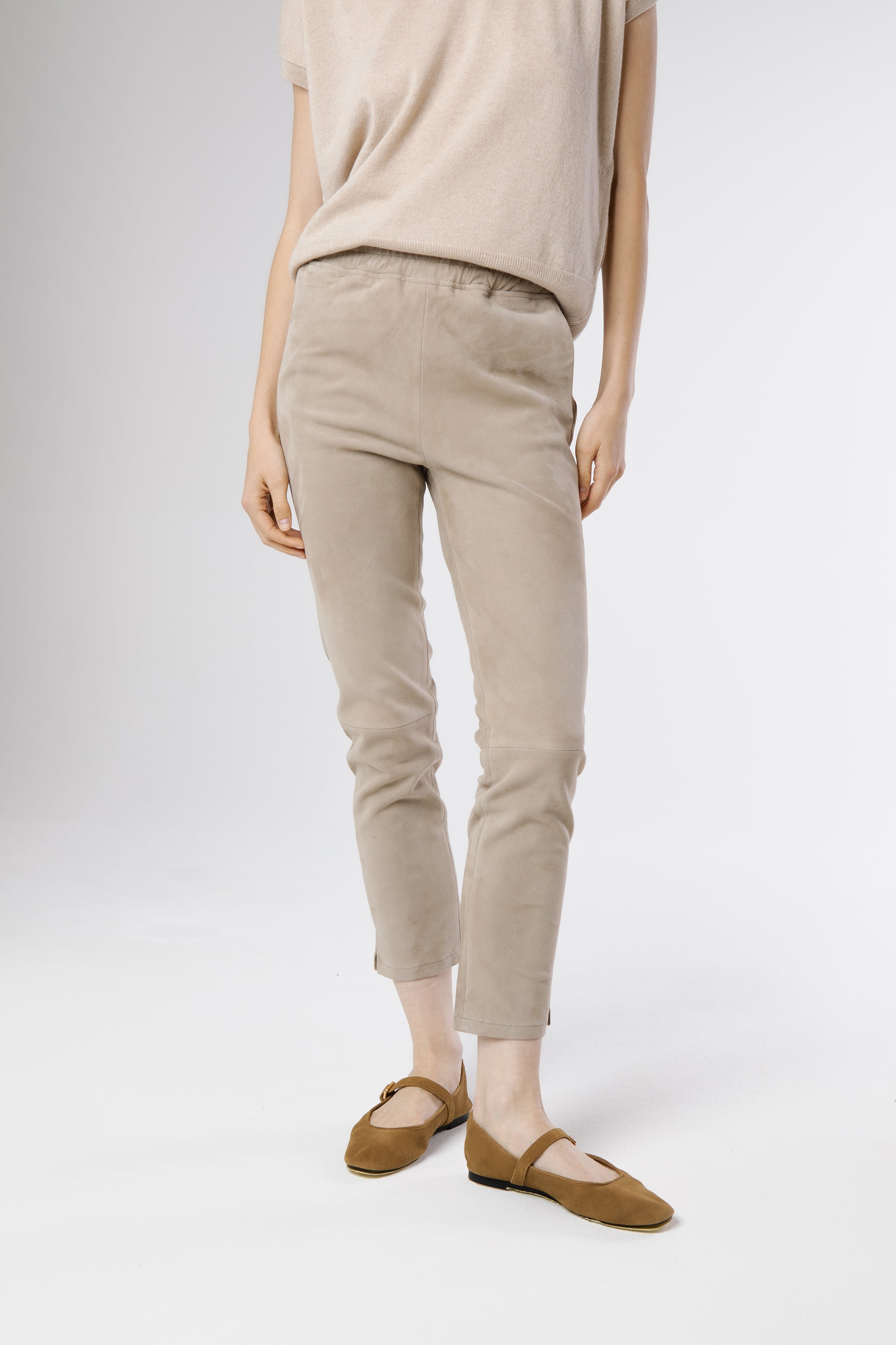 Side profile of the Roma VE Suede Trousers Grey Taupe revealing the refined silhouette and soft, structured drape.