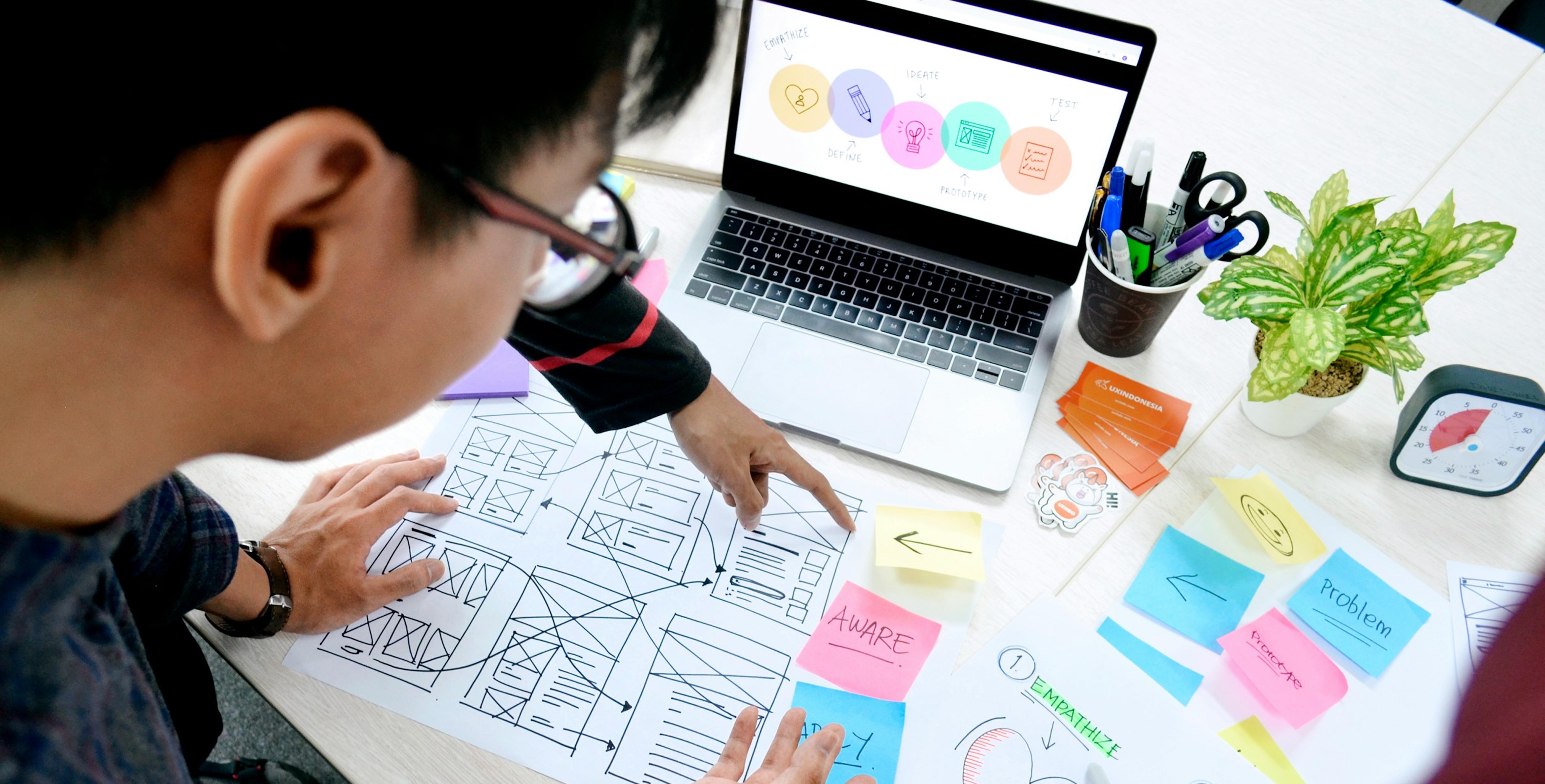 Celebratory handshake between Neon Apps and RevenueCat partners during the official partner announcement event.