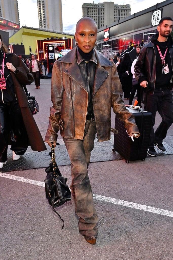 Cynthia Erivo, Las Vegas Grand Prix red carpet, Diesel Fall 2025, Ferrari Spring 2026, Wicked: For Good, Lewis Hamilton, Louboutin Dolly Booty Alta, Atlassian Williams Racing garage
