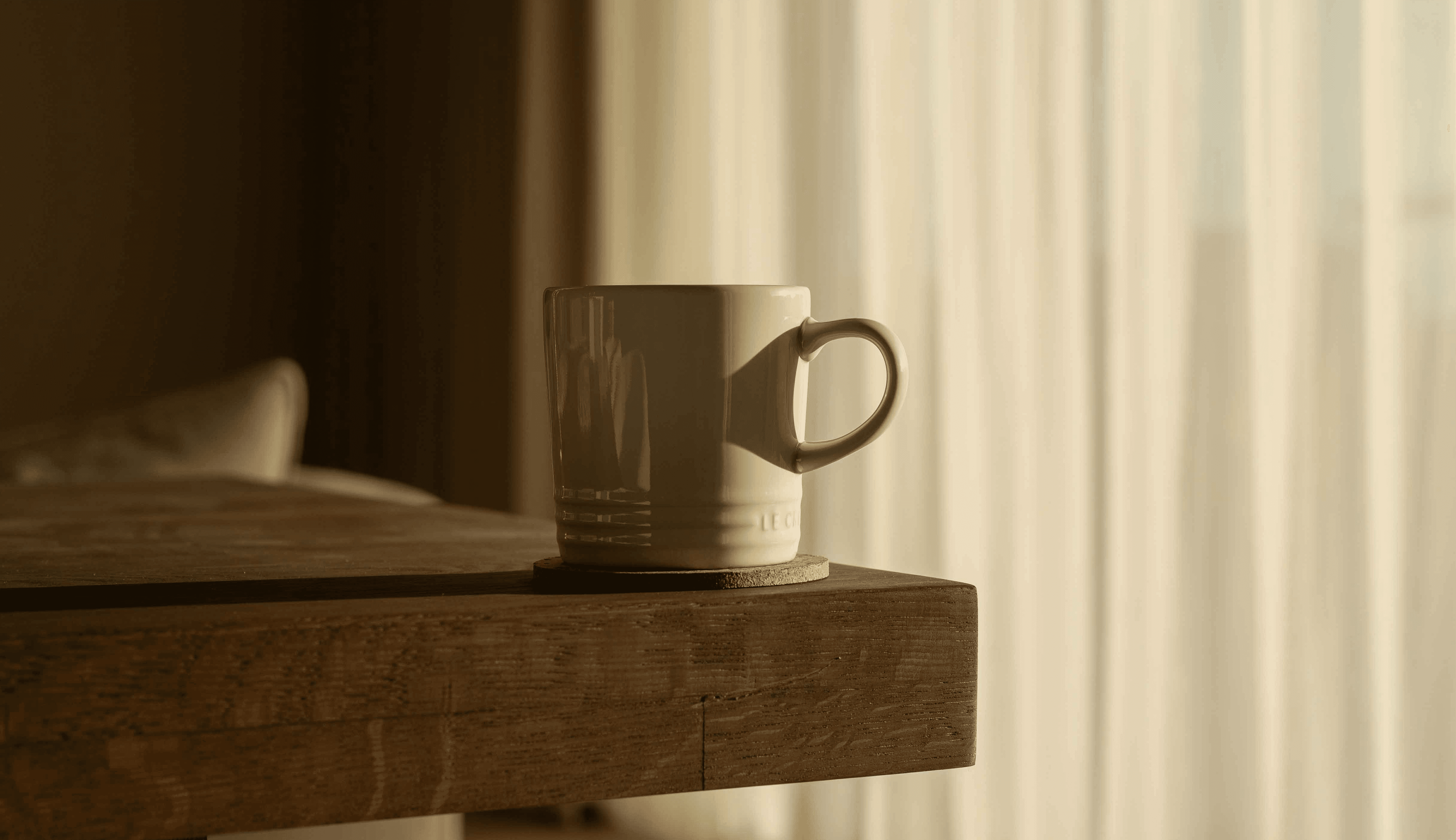 woman sitting near the car